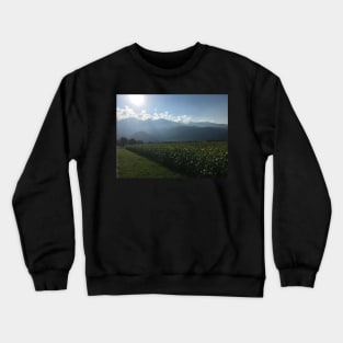 Mountains bathed in sunlight and mist Crewneck Sweatshirt